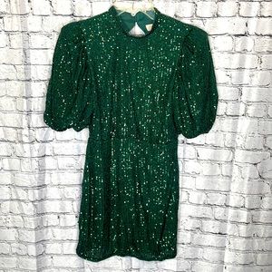 Camila Coelho Cassie Mini Dress in Dark Green, 95%poly 5%spandex Lining100%poly.